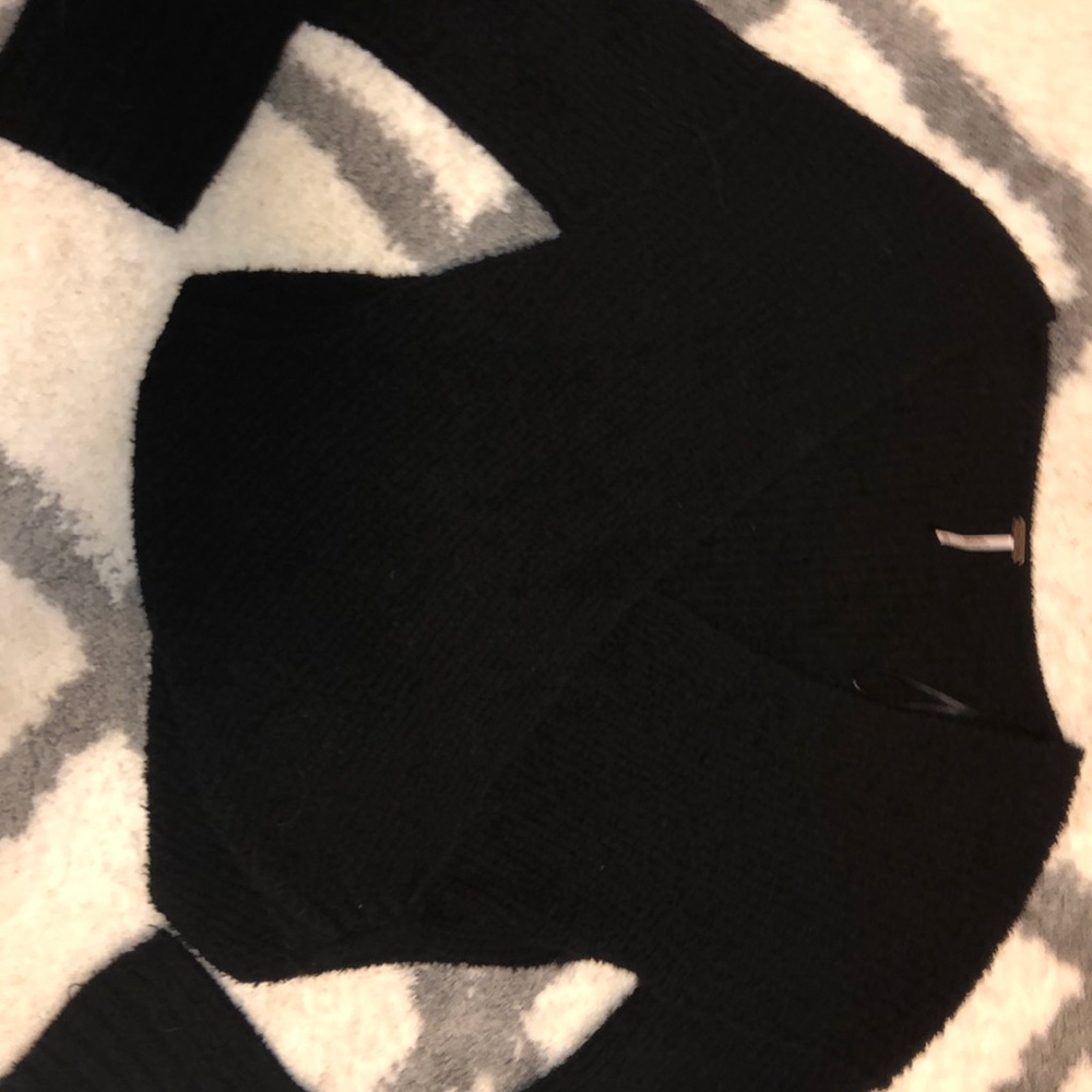 Black cross sweater